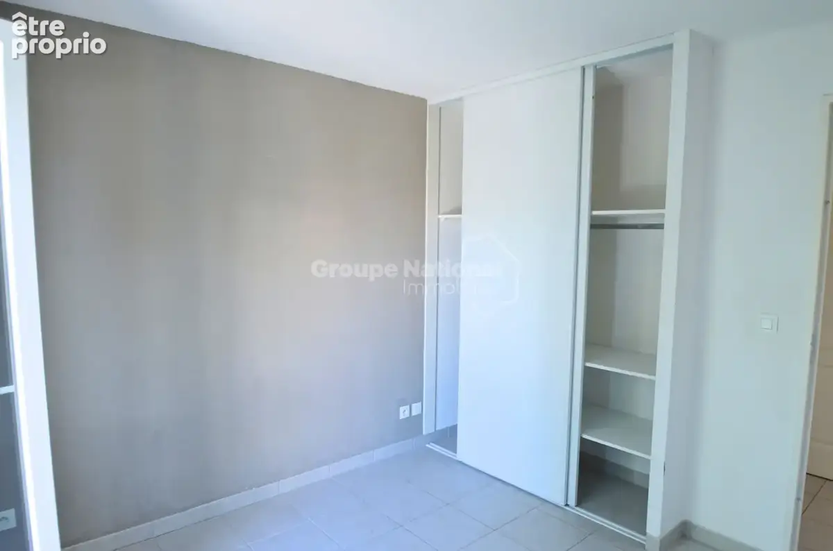 T3 climatisé de 55 m²  avec balcon couvert + garage privatif au sous-sol  dans une copropriété recherchée - photo 7
