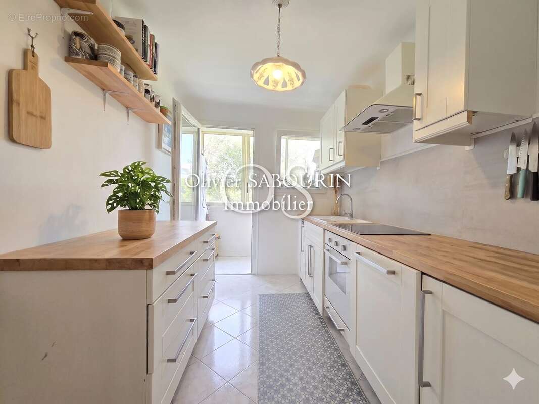 Appartement - 74m² - 2 chambres - Terrasse - photo 4