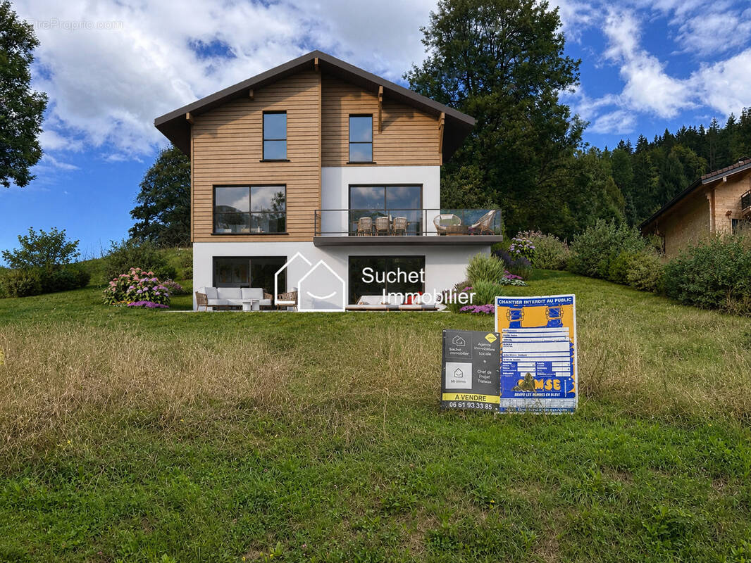 Terrain viabilisé avec vue dégagée et maison de 130 m2 avec sous-sol aménageable - photo 1