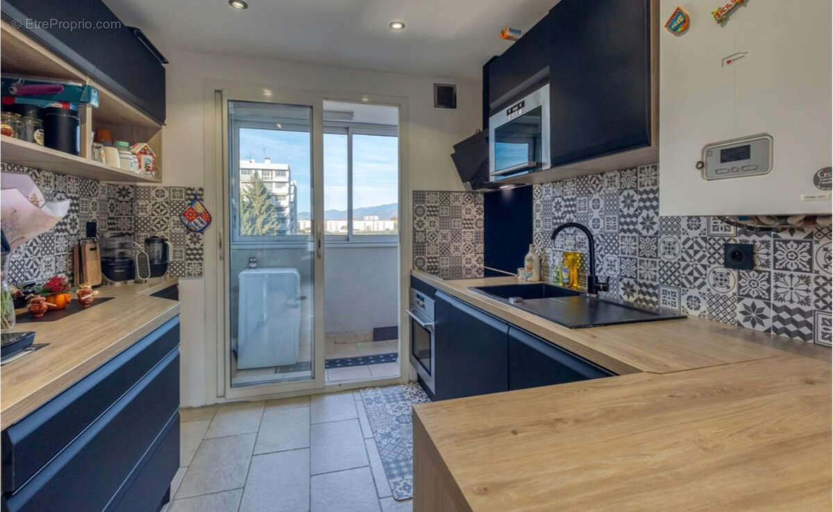 HIDRI IMMO PLUS vous propose un appartement T4 avec balcon et cave à Saint-Martin-d'Hères - photo 4