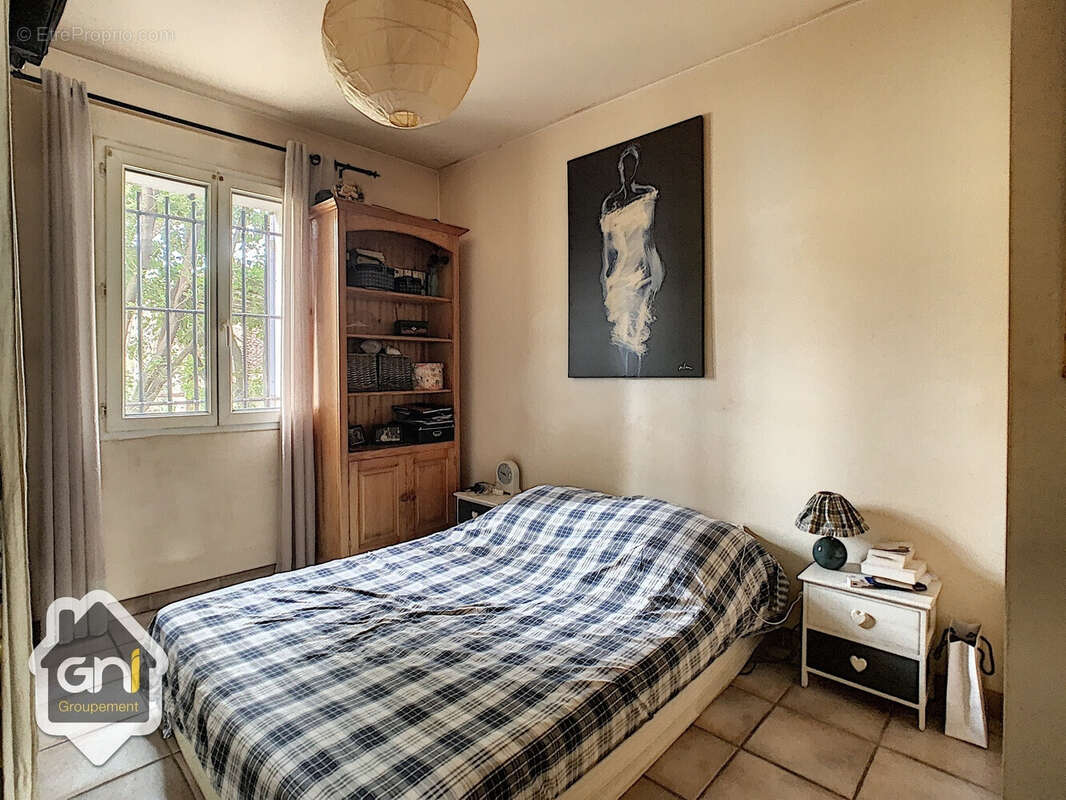 Appartement en rdc - avec parking - photo 2
