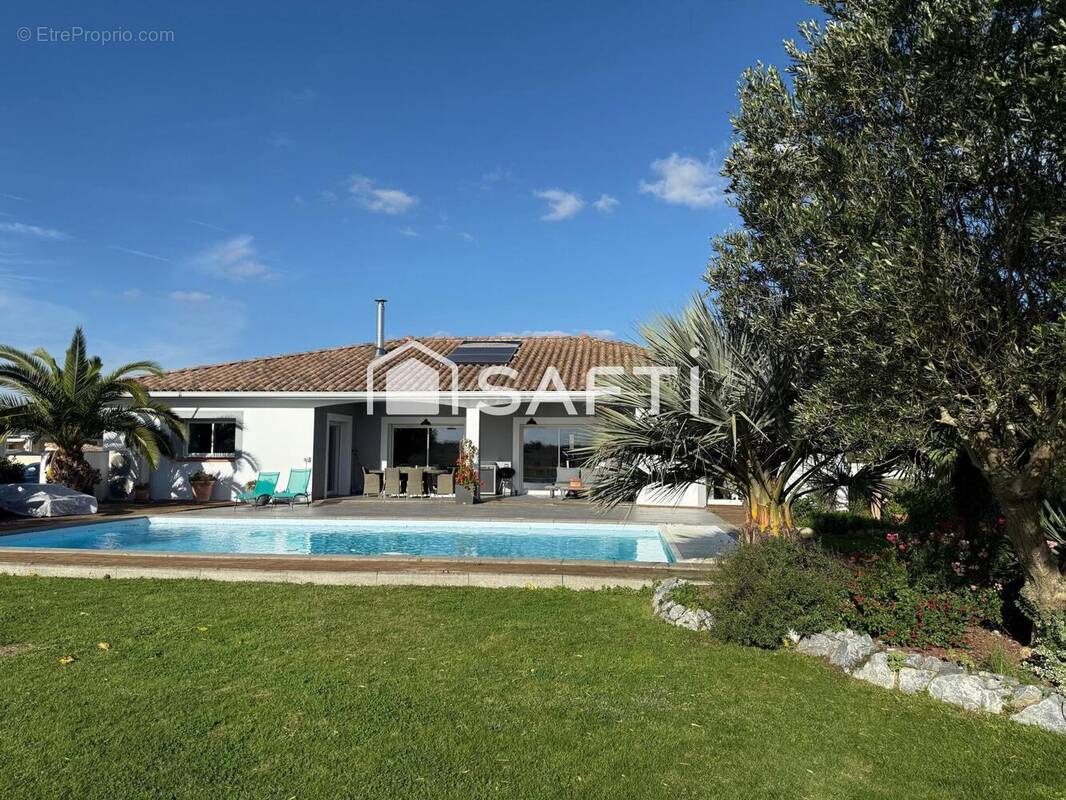 Photo 1 - Maison à PLAISANCE-DU-TOUCH