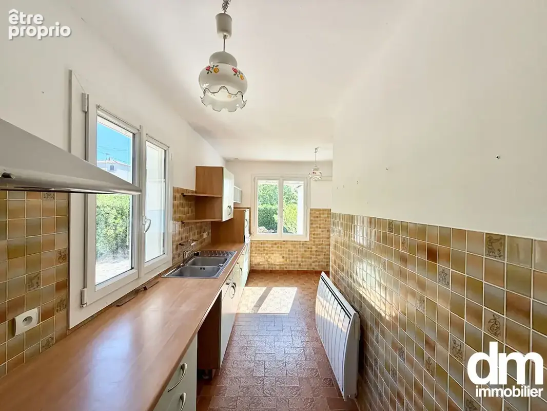 Maison de type 5 avec dépendance sur une parcelle de 570m2 - photo 8