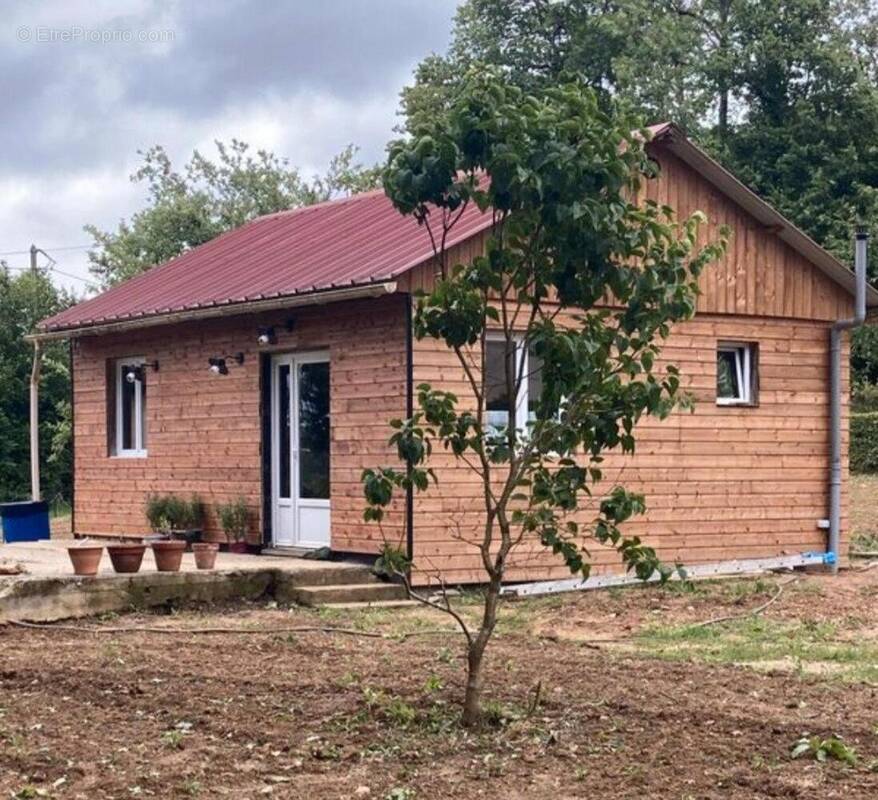 Photo 1 - Maison à SAINT-AQUILIN-DE-CORBION