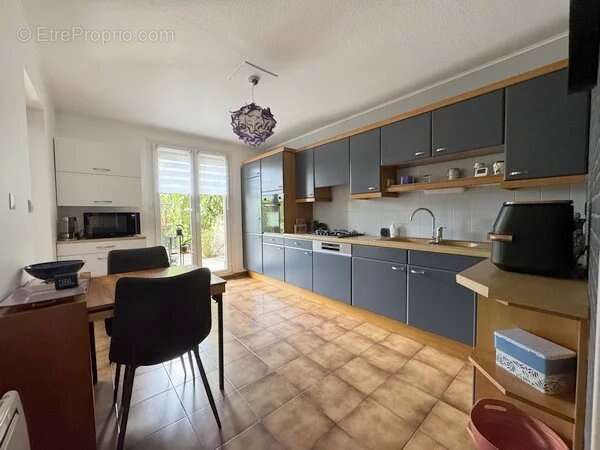 Appartement en rez-de-jardin avec garage et cave - photo 8