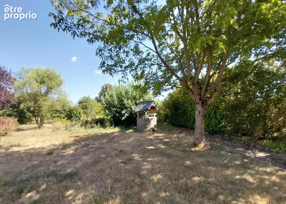 Maison en pierre sur un magnifique terrain arboré avec son plan d'eau - photo 10