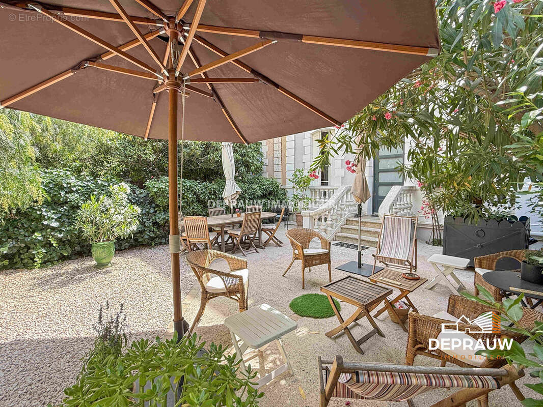 Élégante demeure de caractère de 160 m2 avec jardin arboré de 100 m2 - photo 21
