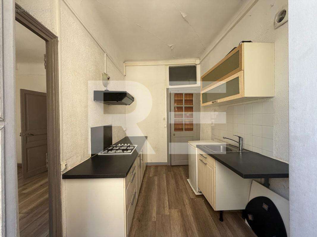 Appartement rue de l'horloge a nimes a renover - photo 4