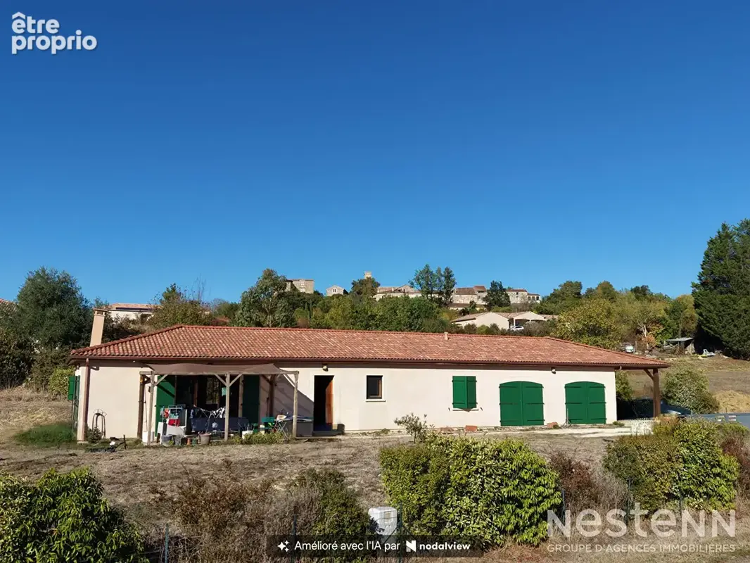 A Vendre Maison contemporaine de plain-pied, double garage, Carport et terrain de 1 731 m². - photo 5
