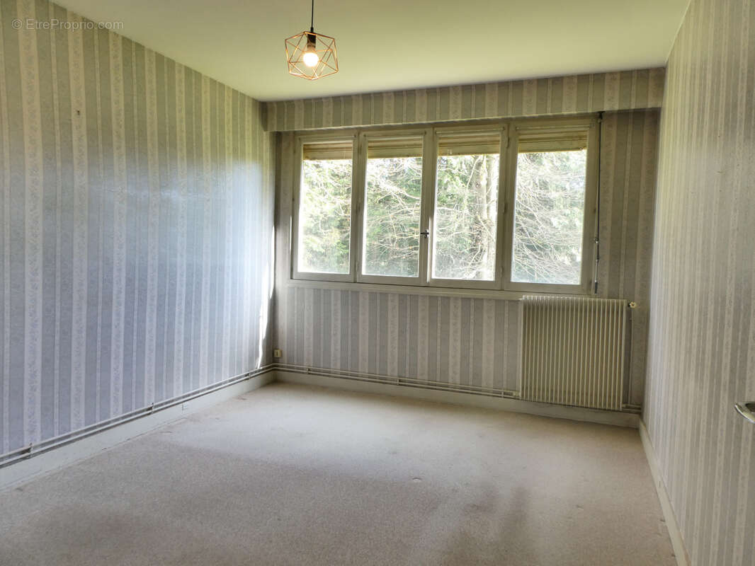 Appartement T3 de plain-pied en rez-de-jardin avec jardinet, garage et cave - photo 6