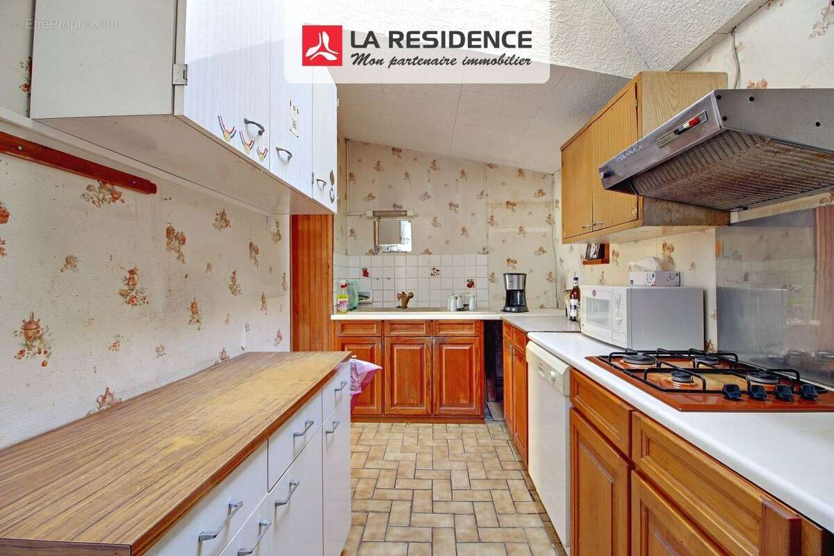 Maison 91 m² à Saint-Etienne-Du-Rouvray  - photo 2