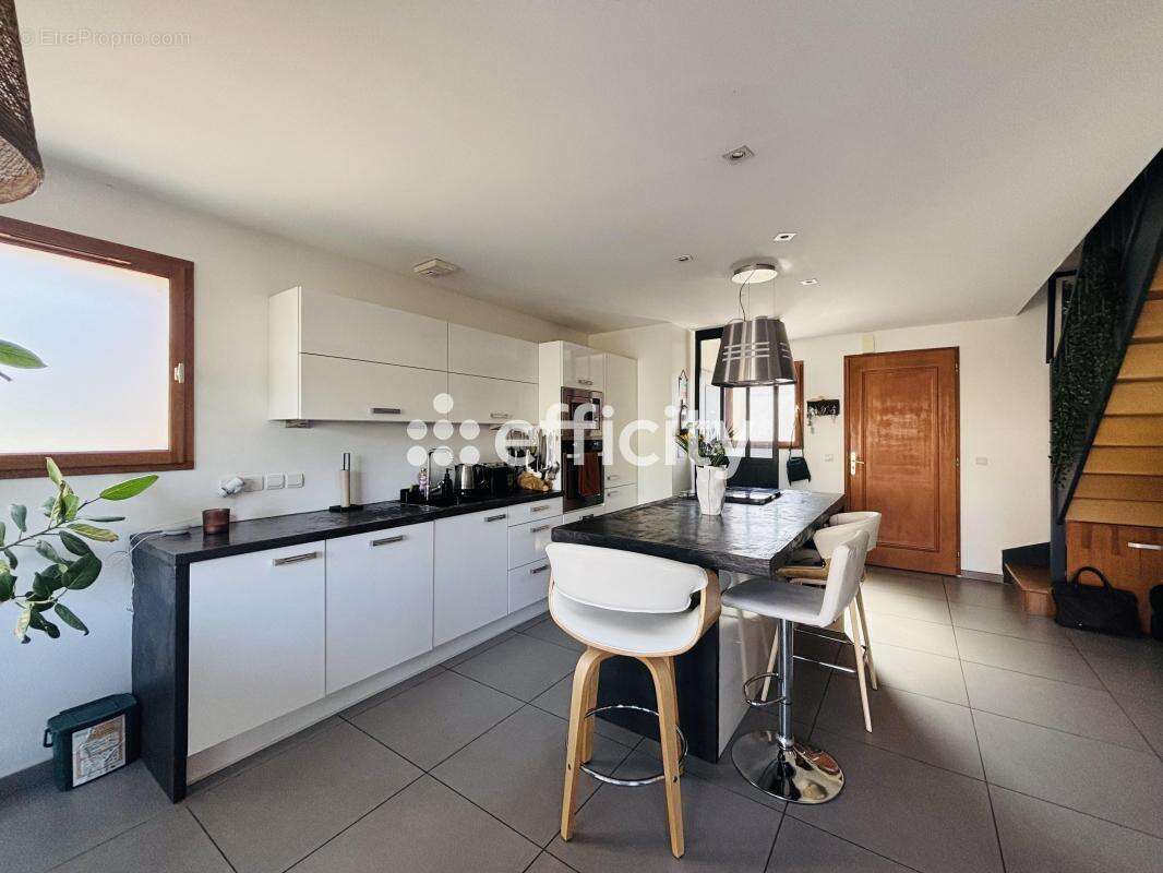 Maison 94 m² à Montagny-Les-Lanches  - photo 5