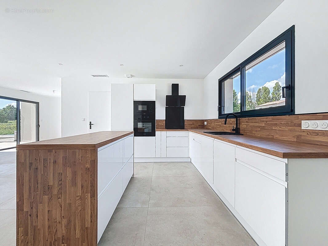 Maison à ARPAILLARGUES-ET-AUREILLAC