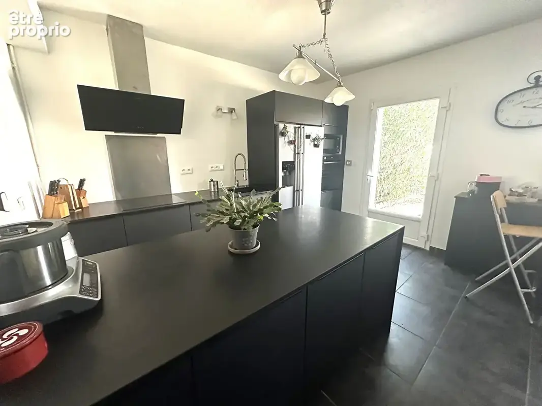 Maison 5 pièces de 130m² - photo 7