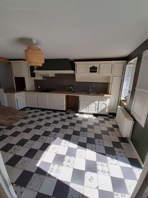 Maison à FLAVIGNAC