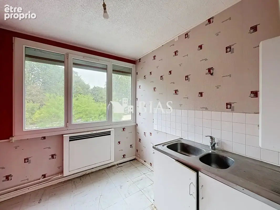 Appartement 3 pièces 55 m² à vendre à Saint-Aubin-Les-Elbeuf (76410) - photo 2
