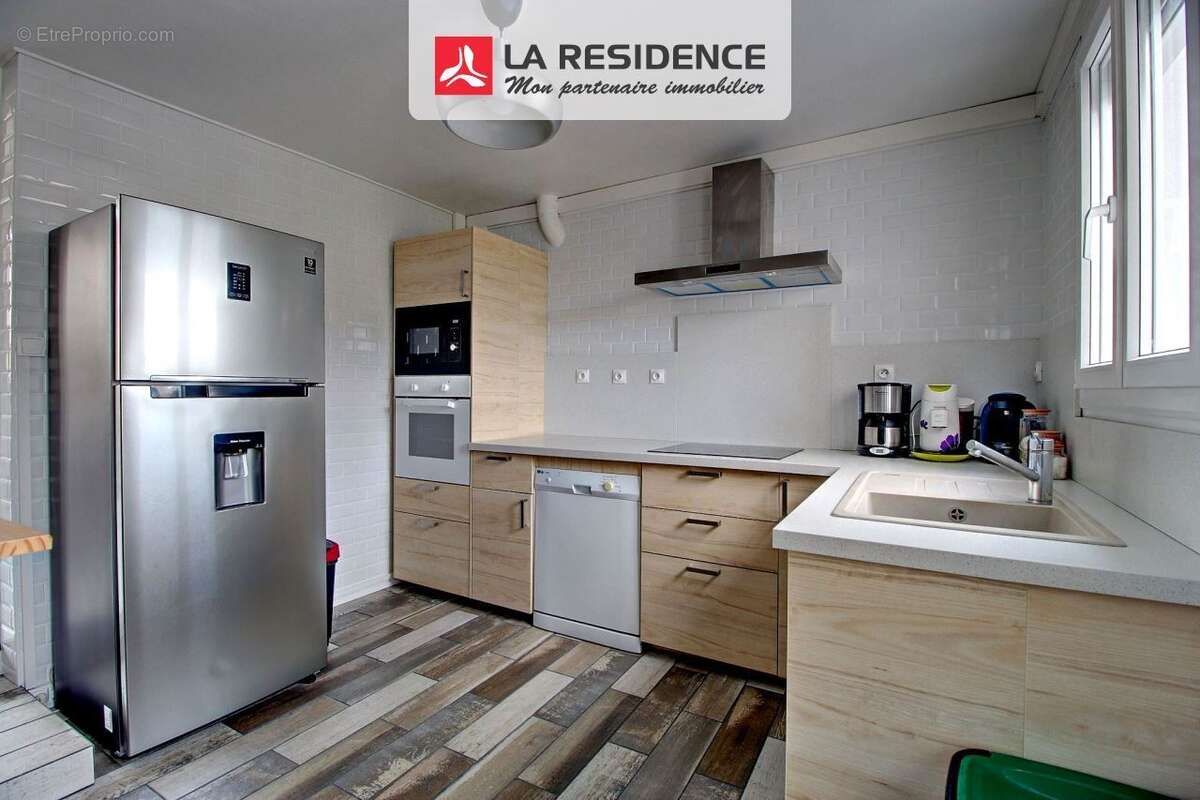Maison 117 m² à Saint-Etienne-Du-Rouvray  - photo 5