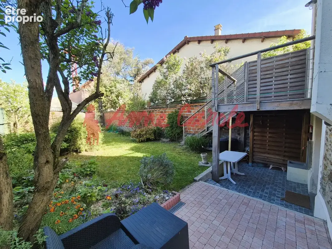 Jolie meulière avec jardin - photo 2