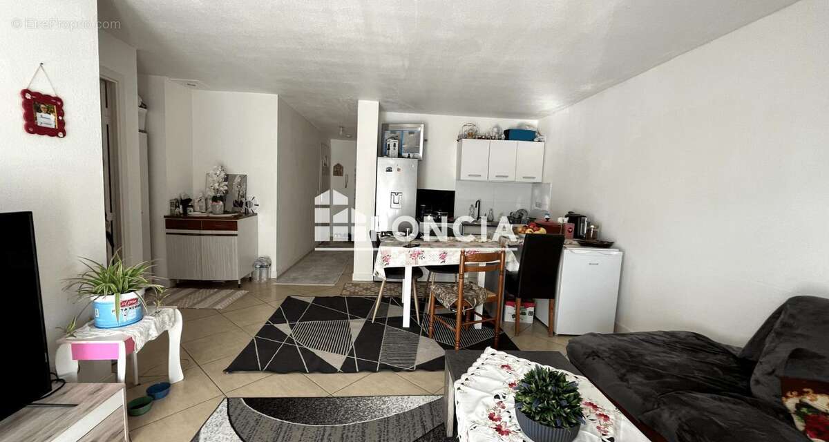 Appartement T4 avec 2 balcons et parking, vendu loué - photo 2