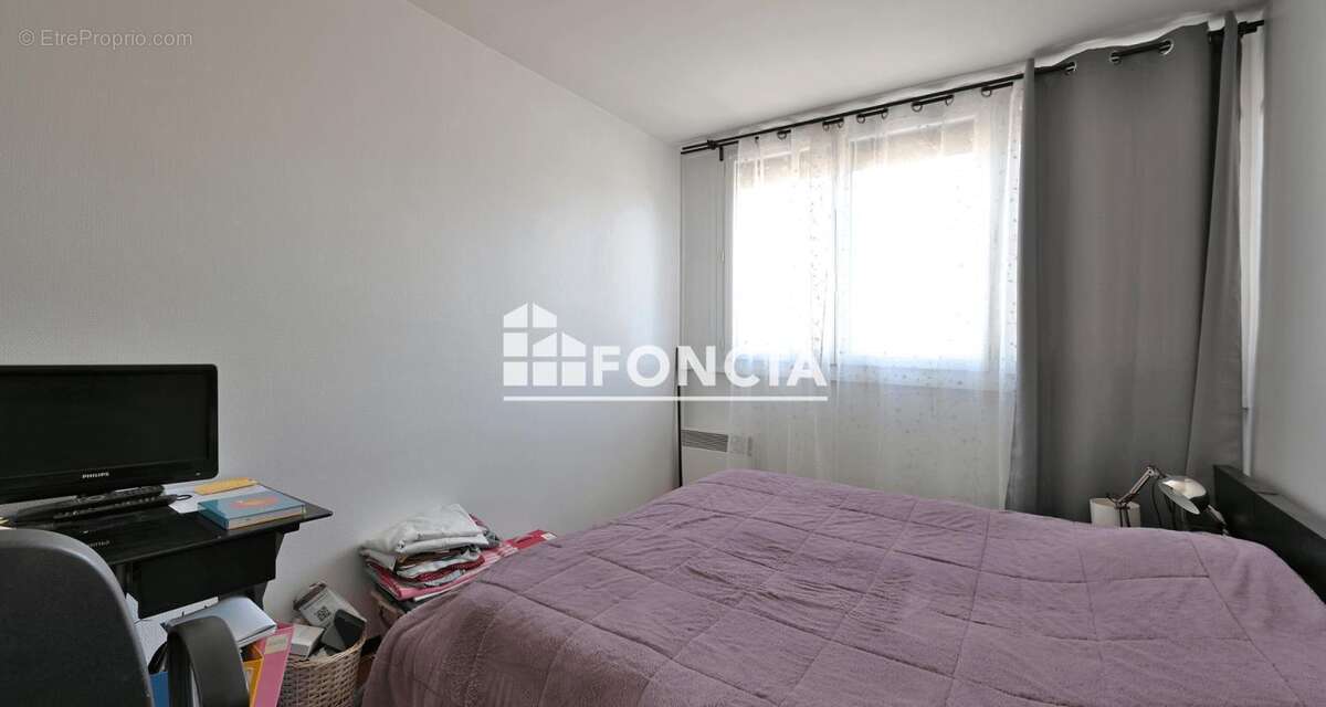 À vendre – Appartement T2 traversant de 52 m² avec terrasse, garage, cave et locataire en place - photo 9