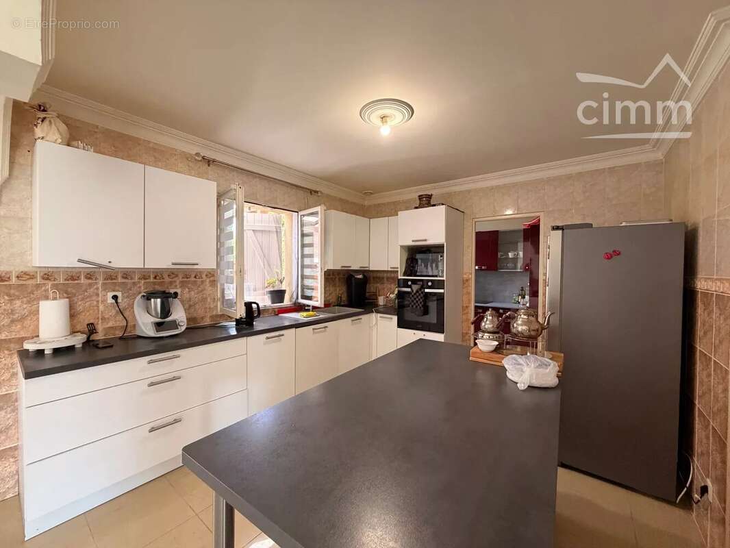 MER – Maison de plain-pied 112 m² – 3 chambres – Terrain 700 m² – Garage - photo 4