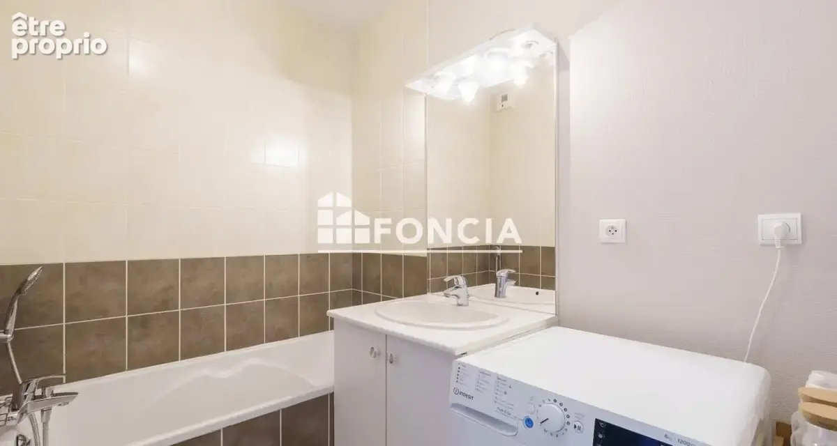 Au coeur d'une copropriété sécurisée, agréable et spacieux T2 vendu loué - photo 5