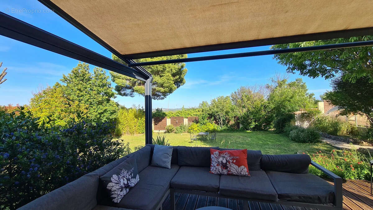 la terrasse couverte - Maison à TOURBES