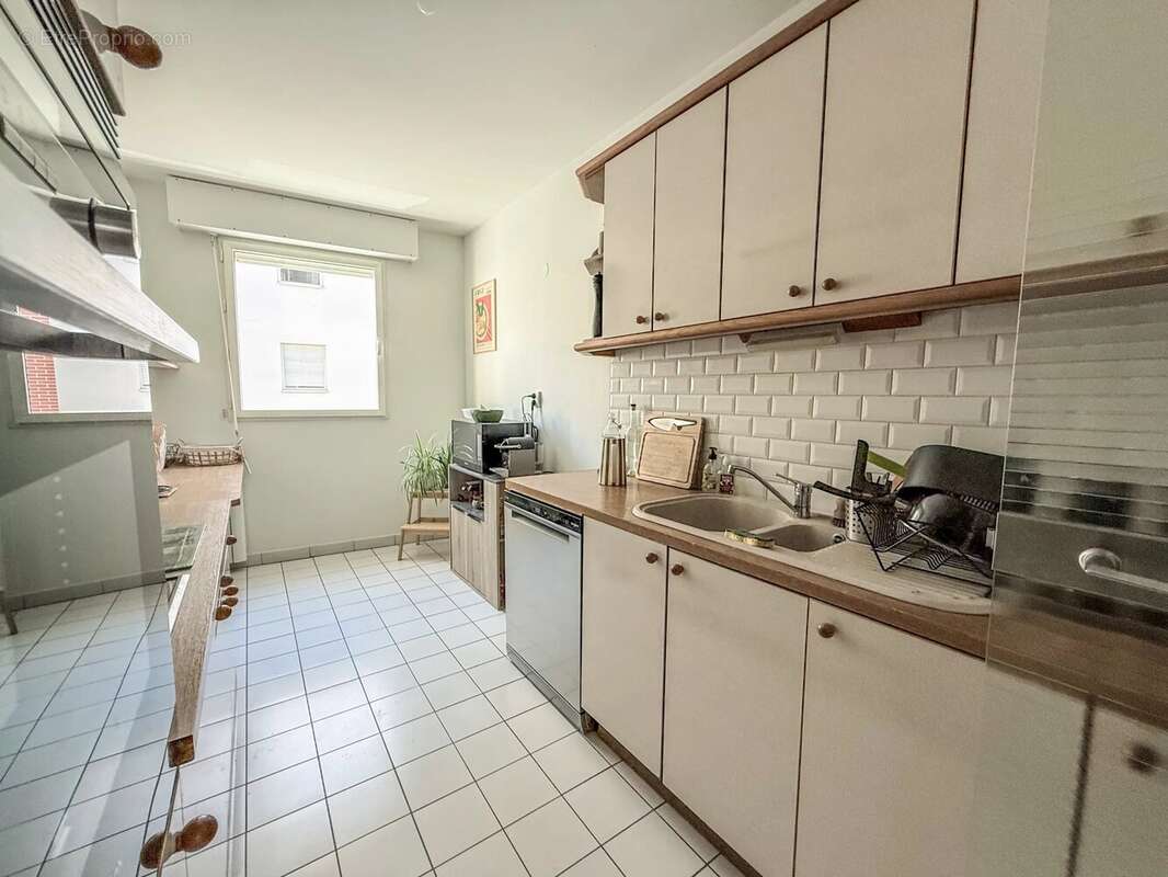 Rouen saint-marc – spacieux t3 de 75 m² vendu loué avec parking, cave et ascenseur - photo 6