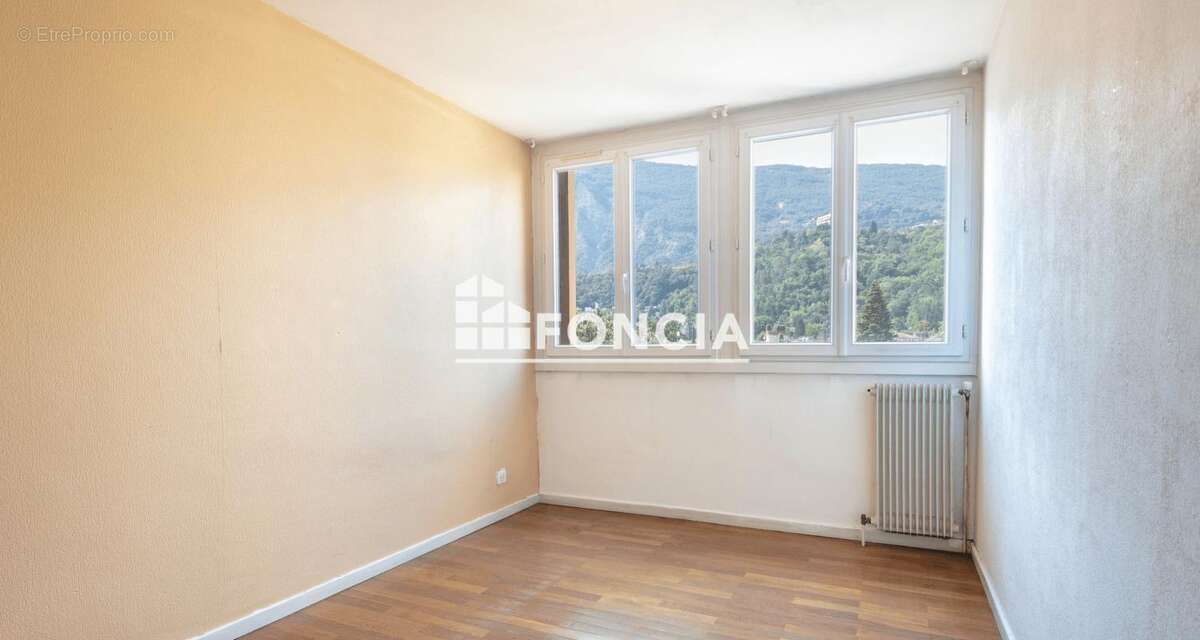 MEYLAN, Secteur Ayguinards, T3 de 56 m2 au 4ème étage avec balcon - photo 4
