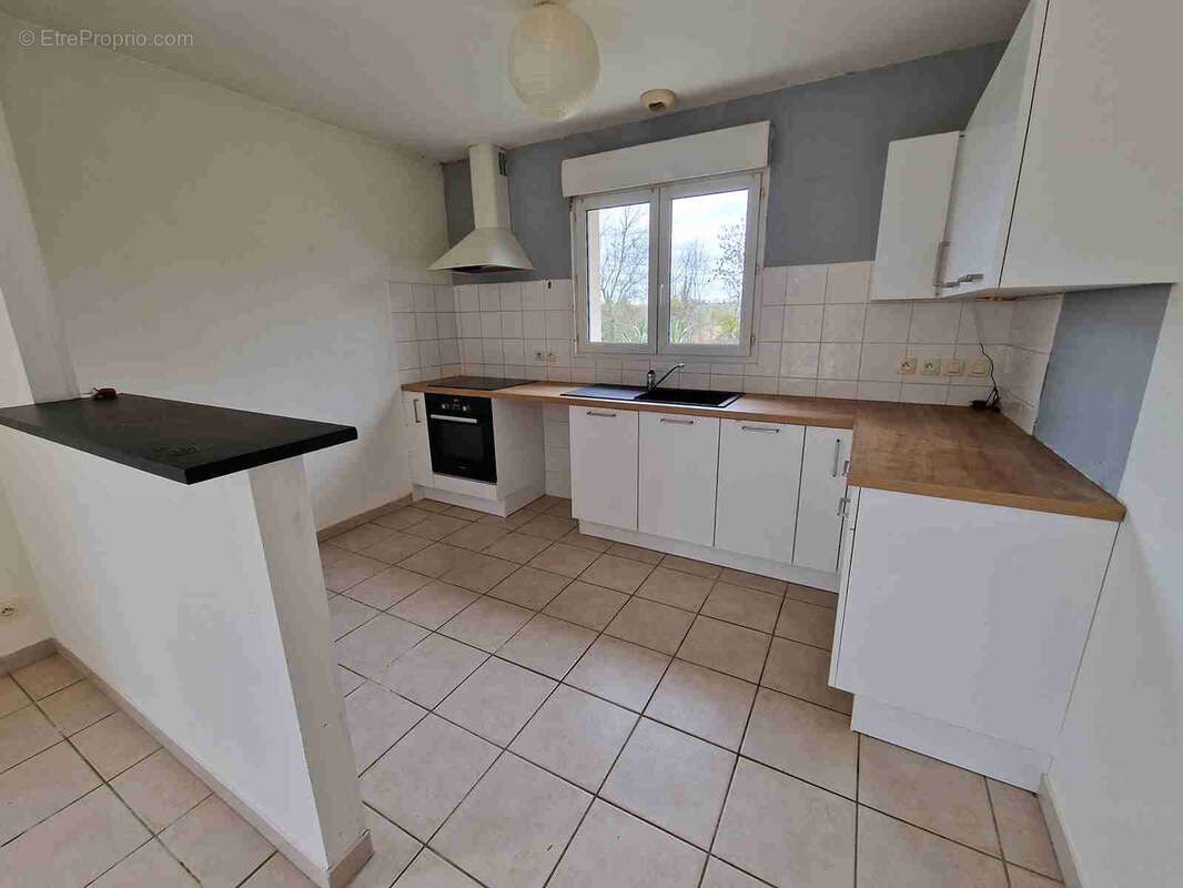 Maison de plain-pied avec jardin et garage - photo 7