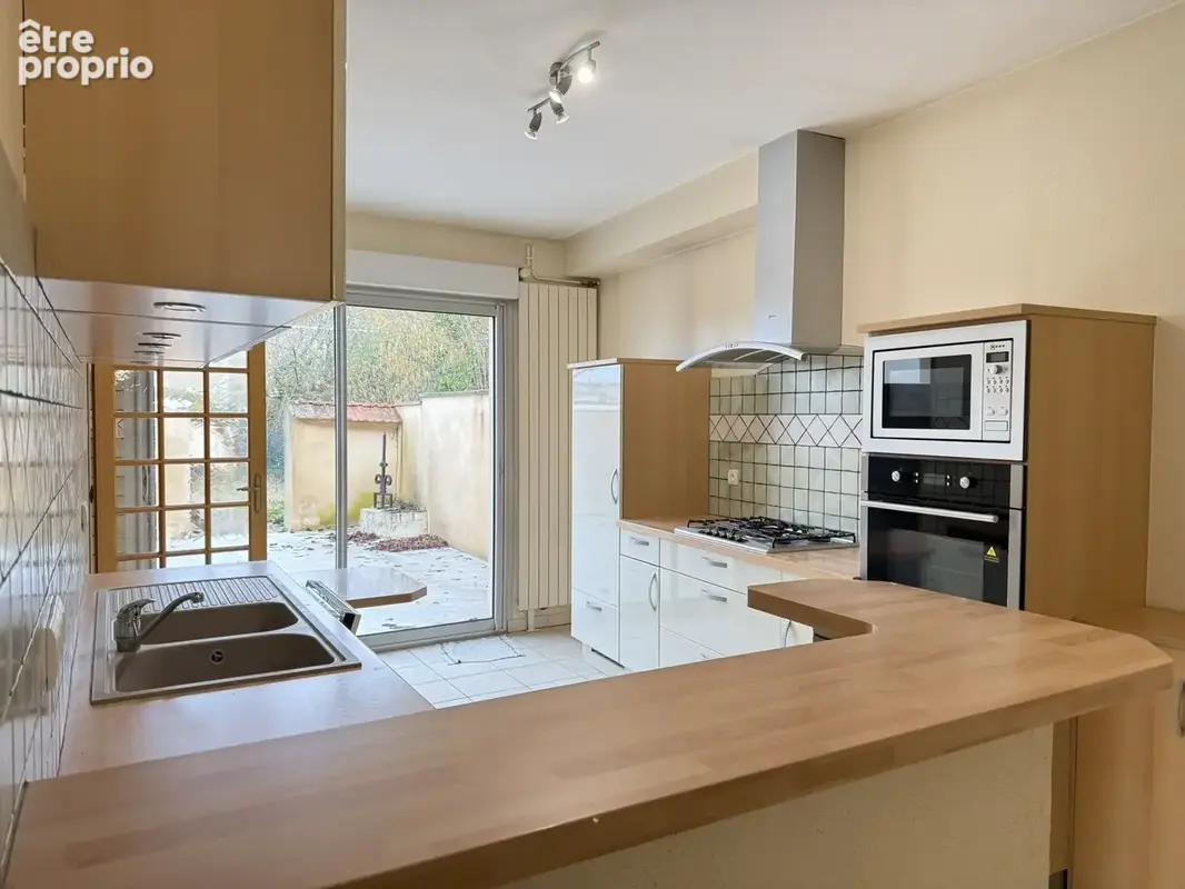 Maison 5 pièces 127 m² à vendre à Chateauroux (36000) - photo 2