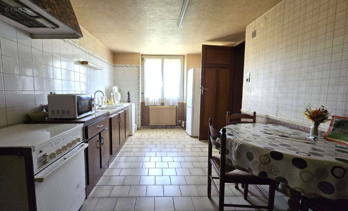 Maison familiale avec grand terrain arboré ? Un bien rare au fort potentiel - photo 4