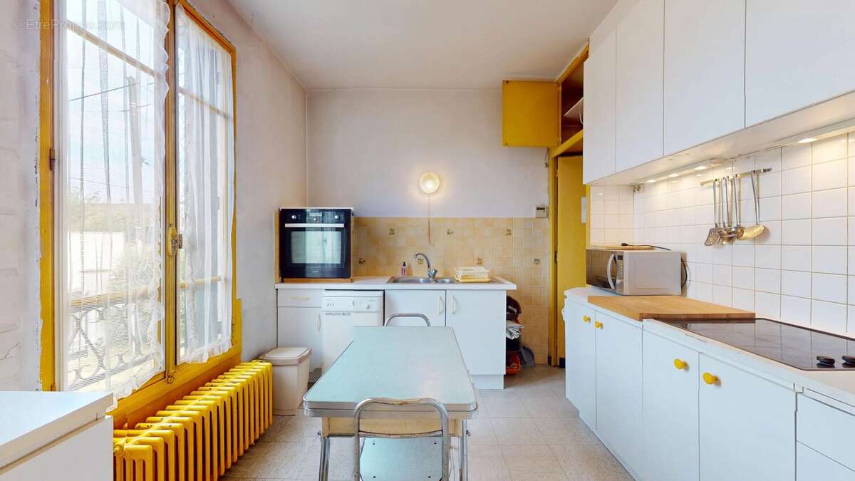 Maison 100 m² à Montfermeil  - photo 8