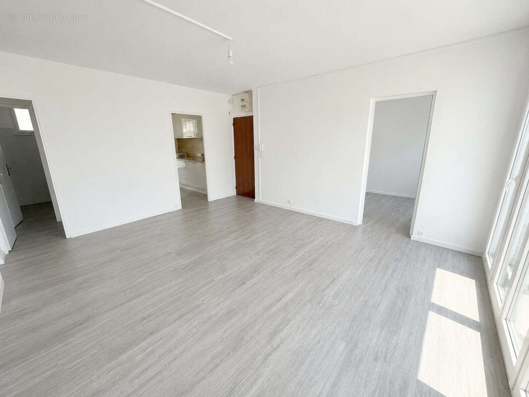 Appartement T4 traversant de 68m2 avec 3 chambres à proximité des commerces et écoles - photo 4