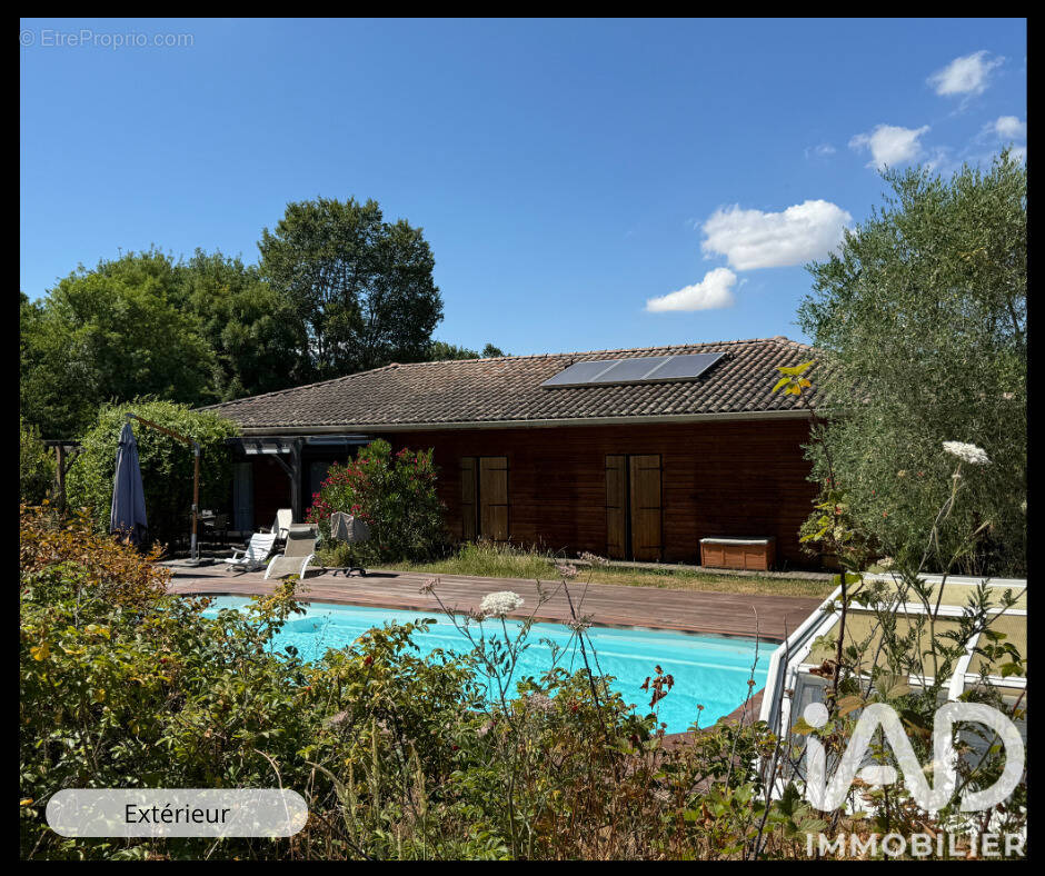 Photo 1 - Maison à SAINTE-FOY-DE-PEYROLIERES