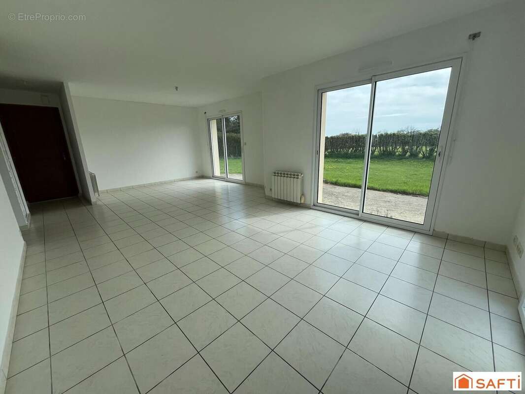 Photo 2 - Maison à LE TREVOUX