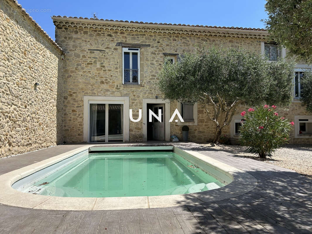 Maison à LAUDUN-L'ARDOISE