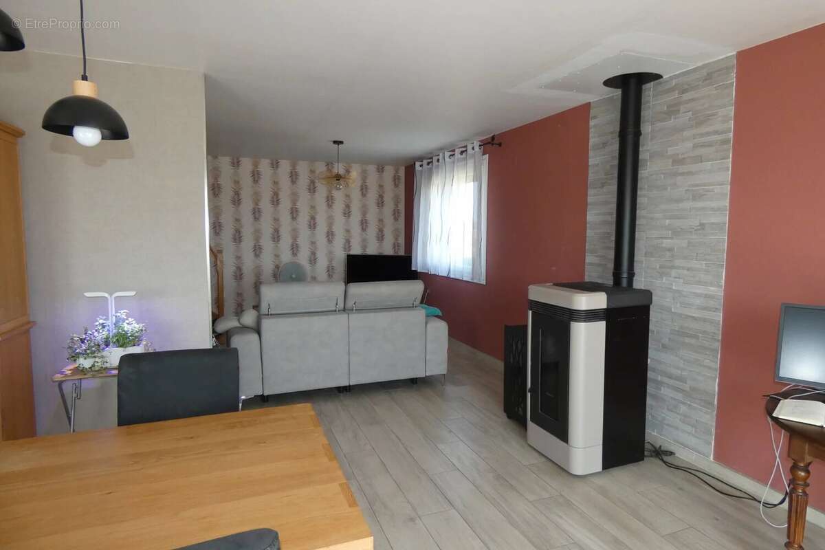 Dans un charmant bourg proche de montcenis - pavillon sur sous-sol - photo 6