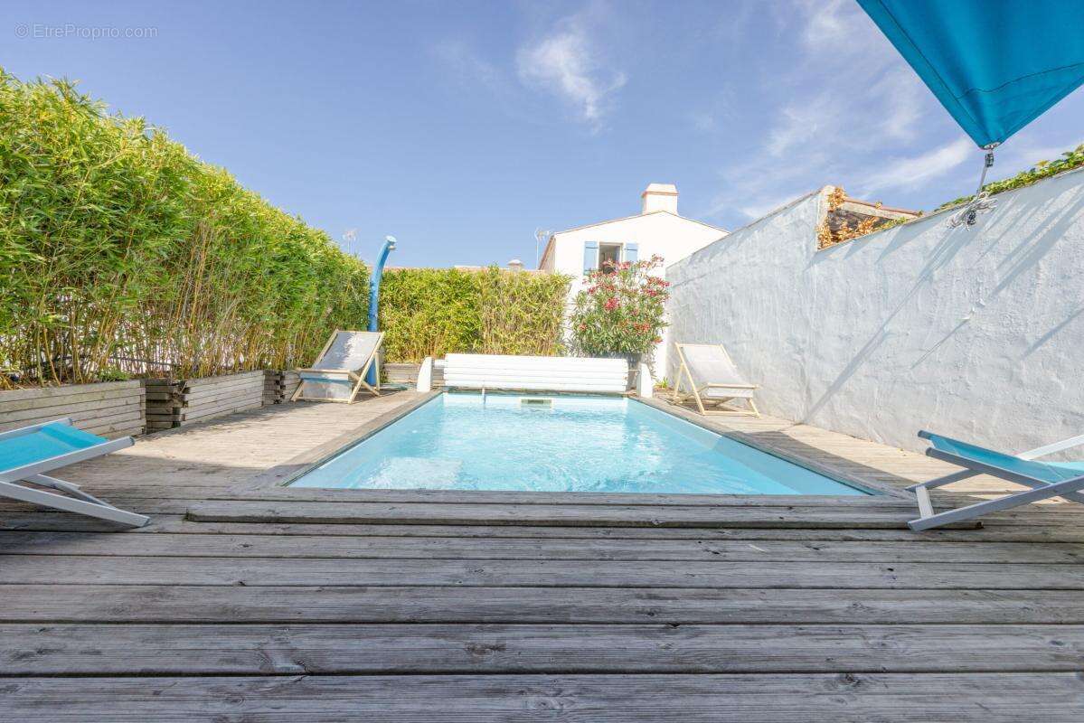 Maison de plain pied de 137m² - photo 2
