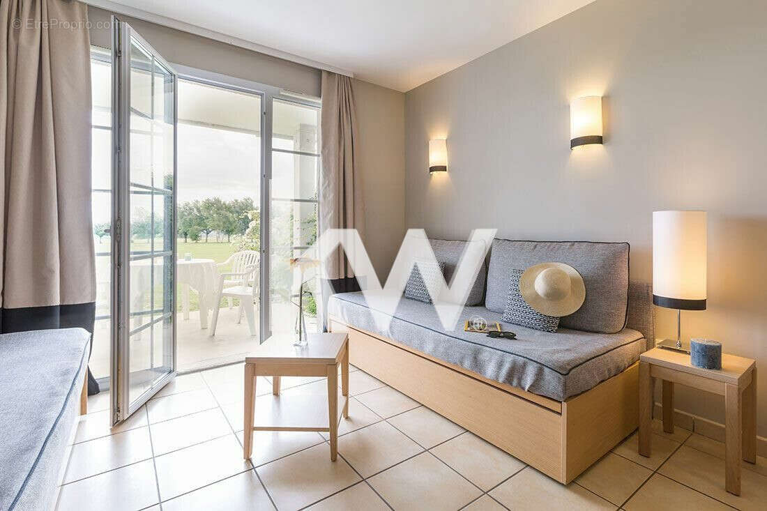 Maison 31 m² à Port-En-Bessin-Huppain  - photo 6