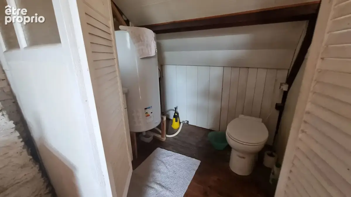 CÔTES-D'ARMOR, Proche de Bon Repos, Charmante Maison Mitoyenne 2 Chambres, Beau Potentiel - photo 7