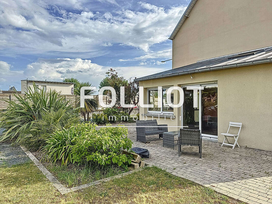 Maison à AGON-COUTAINVILLE