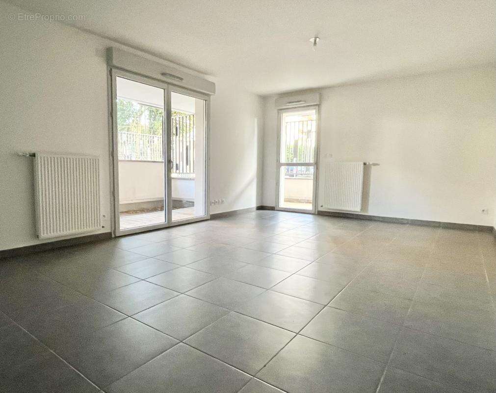 GUILHEMERY - T3 avec terrasse/jardin et parking - photo 3