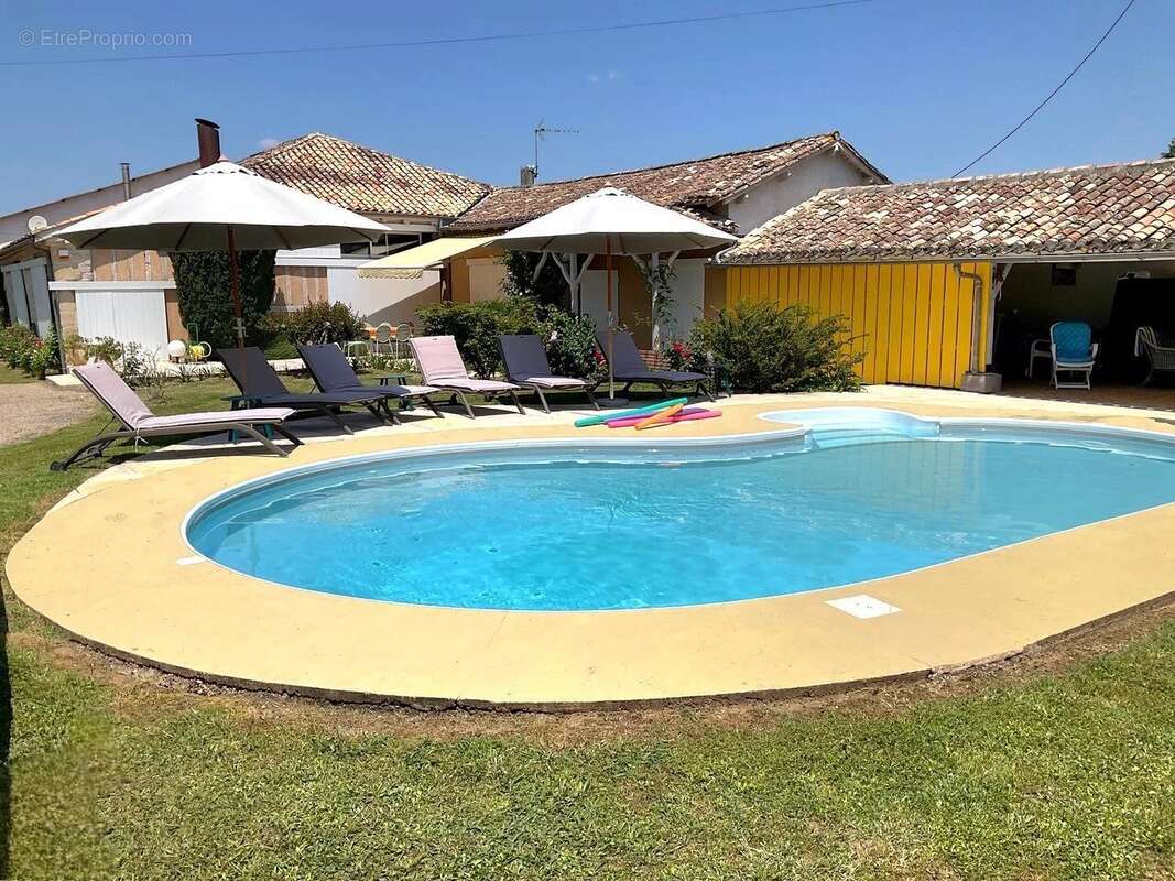 Conversion de grange moderne et ferme familiale traditionnelle - photo 2