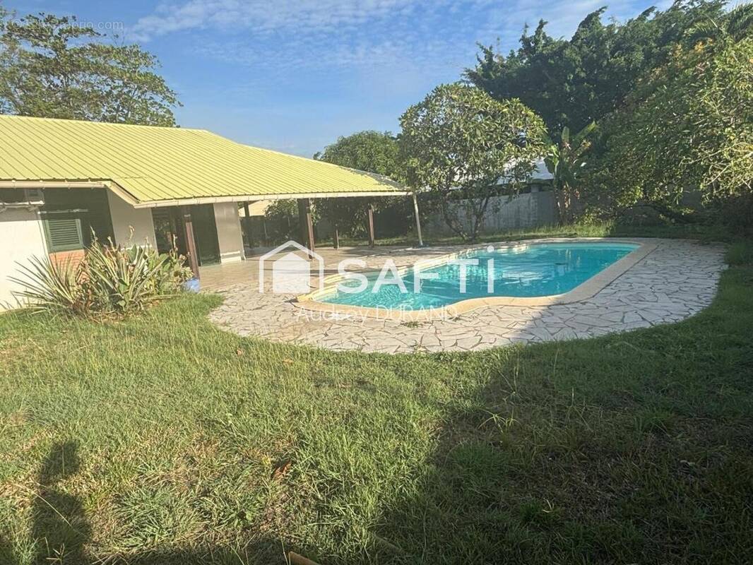 Photo 1 - Maison à REMIRE-MONTJOLY