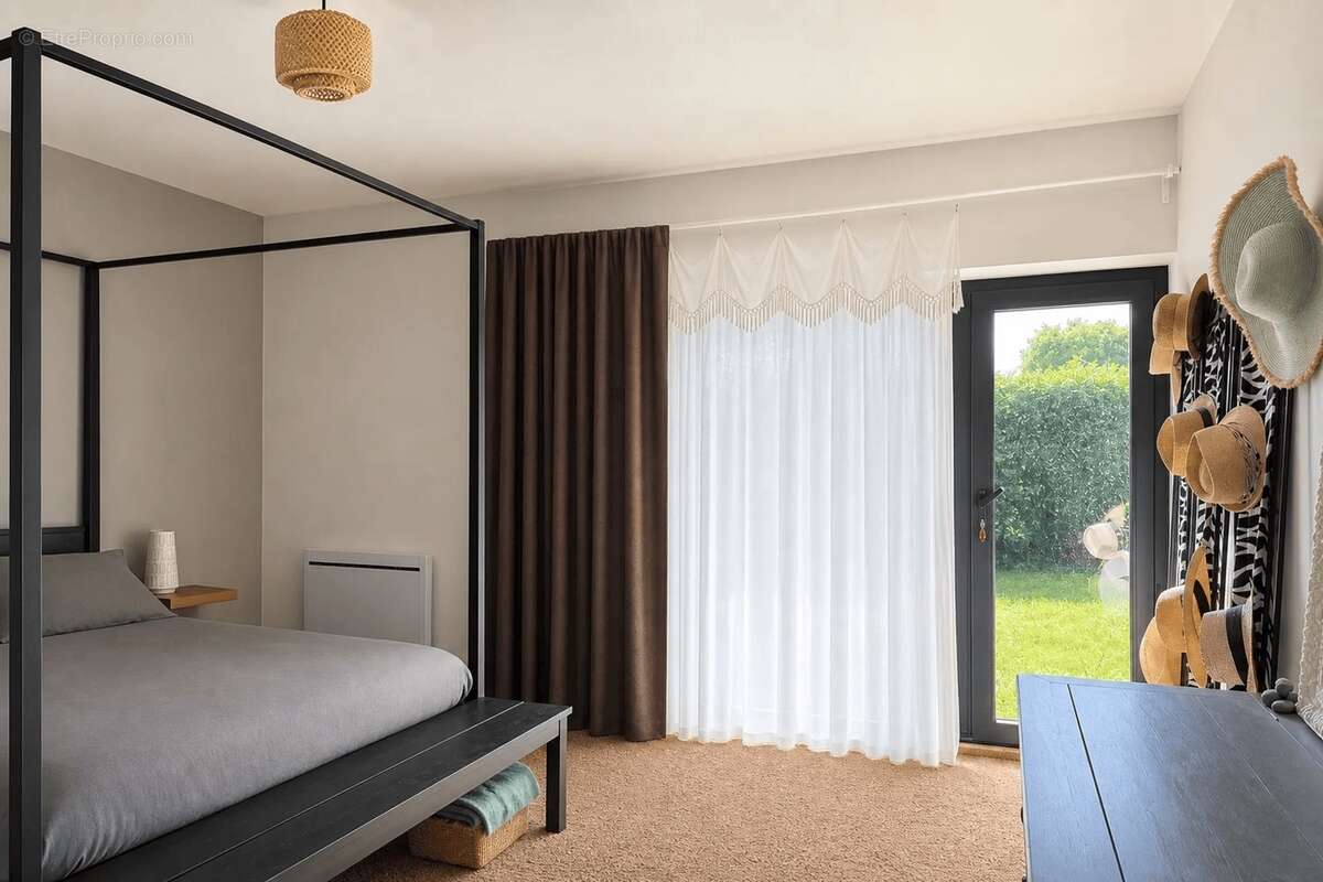 Maison familiale en pierres de caractère – 205 m² – 4 chambres – Jardin de 1 000 m² – Bréhan - photo 14