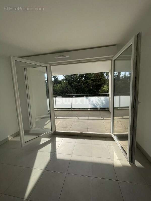 Appartement t3 avec terrasse & double garage - photo 4