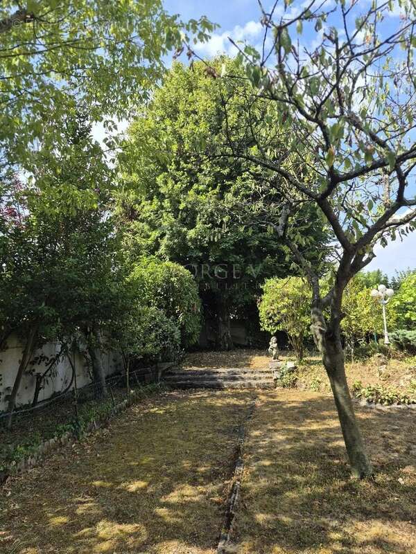 Maison individuelle 8 pièces, 5 chambres sur un terrain arboré de 933 m² - photo 24