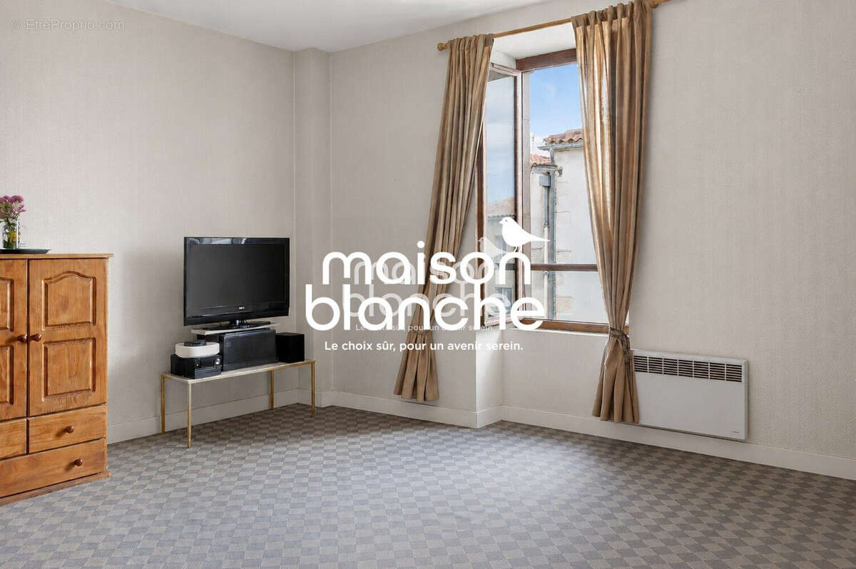2 - Appartement à AIGREFEUILLE-D'AUNIS