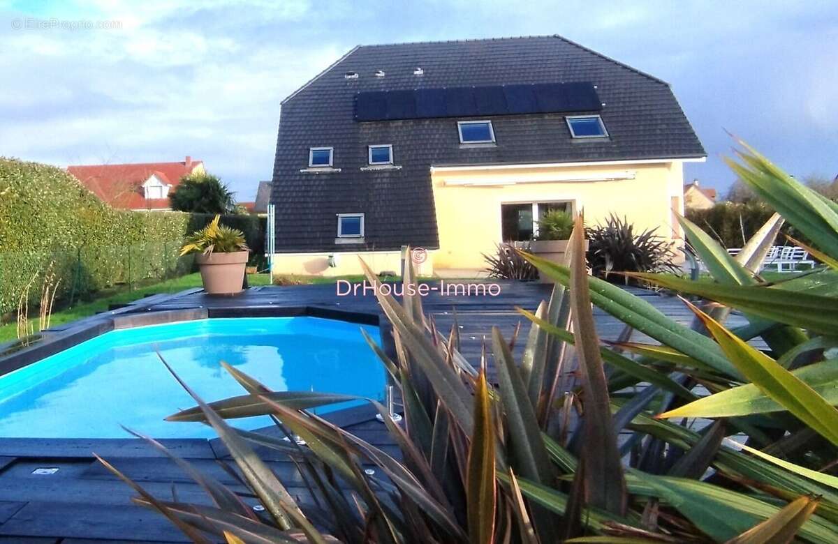 Maison à SAINT-OUEN-DE-THOUBERVILLE